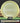 Discraft Zone disc golf disc with Armory Disc Golf branding on a grass and log background