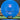 Blue disc golf disc with Discmania and Armory Disc Golf branding on a grass and log background.