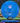 Blue disc golf disc with Discmania and Armory Disc Golf branding on a grass and log background.